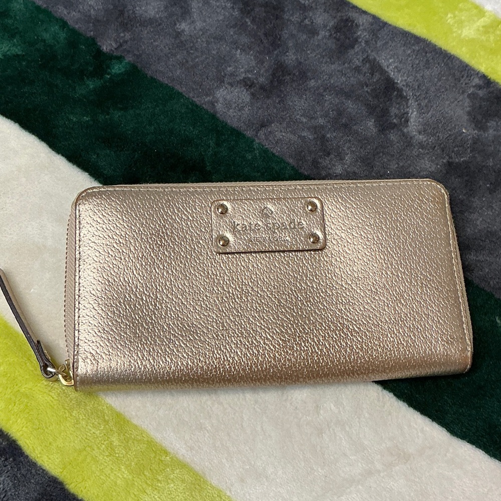 kate spade metallic rose gold zip-around wallet